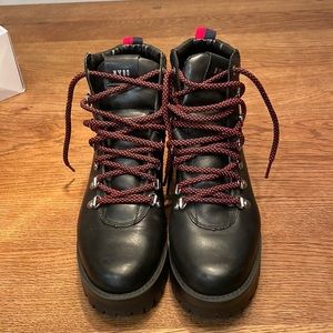 Black leather Steve Madden boot. Size 8.5